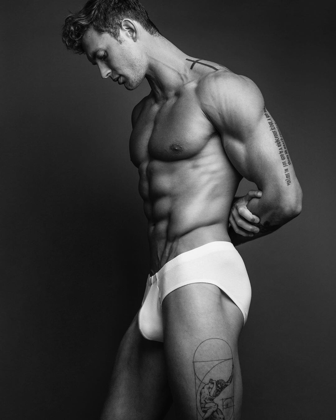 Supermodel Christian Hogue in black speedos and white briefs. damnnnn that ...