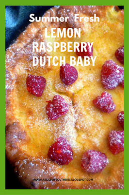 Lemon Raspberry Dutch Baby: A tender, eggy, over-sized pancake laced with bright lemon and topped with tart fresh raspberries.   As wonderful to eat as it is spectacular to look at, no one has to know how easy this is to make! - Slice of Southern