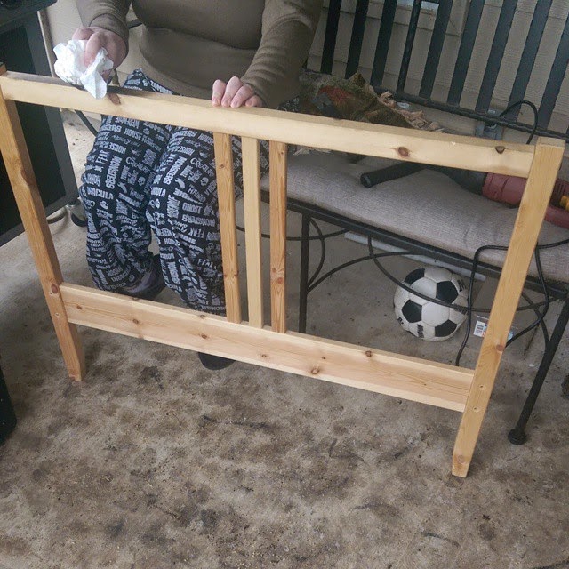 The Redheaded Dreamer Ikea head board turned dog gate.