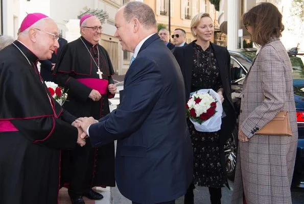 Princess Charlene wore Polo Ralph Lauren floral georgette dress. Princess Caroline of Hanover wore Prada wool-blend coat