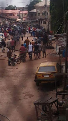 m Photos: Protest at Akowonjo, Lagos as policeman kills South African based young man