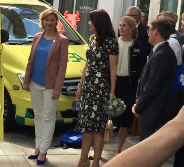 Crown Princess Mary attended the opening of Europe Emergency Medical Services 2016 Congress at Tivoli hotel. Princess Mary wears Christian Louboutin shoes, Style Chanel beige Jumbo Classic bag