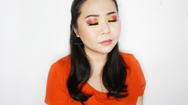 Colorful neon makeup tutorial with Urban Decay Electric Palette using red, yellow, orange, blue and green neon colors. A super pigmented neon colors with an amazing blending ability to make the cool and warm colors blend in together.