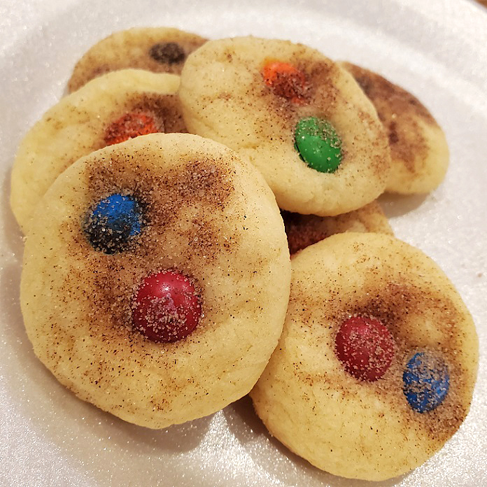 these cookies are called snickerdoodles with cinnamon sugar and m m's on top