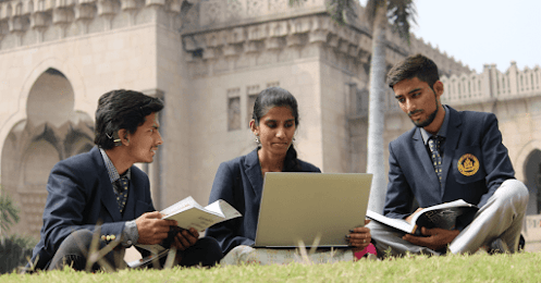 three students studing