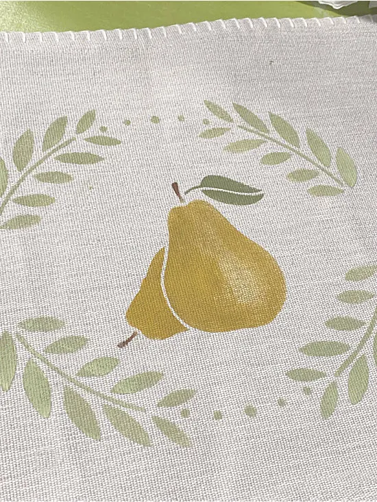 pear stenciled on a pillow