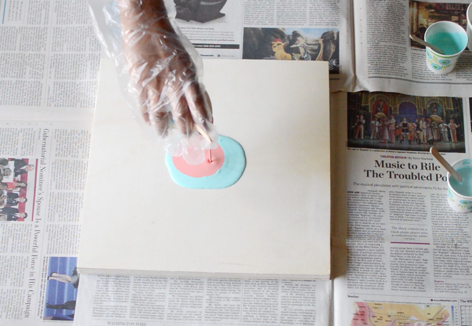 Vikalpah How to paint pour using acrylic paint and Mod Podge on wood panel