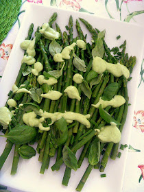 Asparagus and Avocado-Herb Dressing:  Nice tender asparagus is blanched until bright green, cooled, and then doused with an amazing avocado-herb dressing and topped with fresh basil, and chives! - Slice of Southern