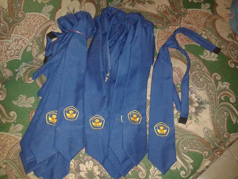 Cara Memperbaiki Dasi Sekolah