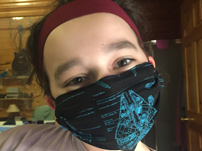 My 11 yr old and his new Star Wars mask