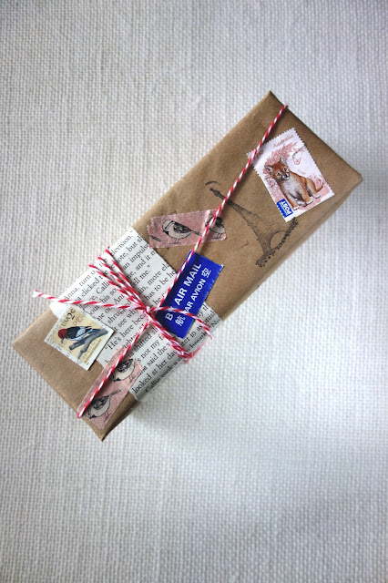 uses for old postage stamps, gift wrapping with postage stamps, creative gift wrapping, blah to TADA!