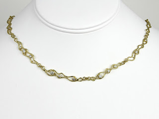 yellow gold link necklace with diamonds