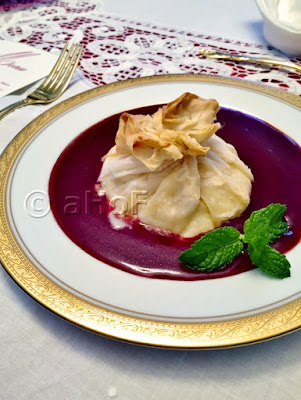 Brie in Phyllo with Raspberry Sauce