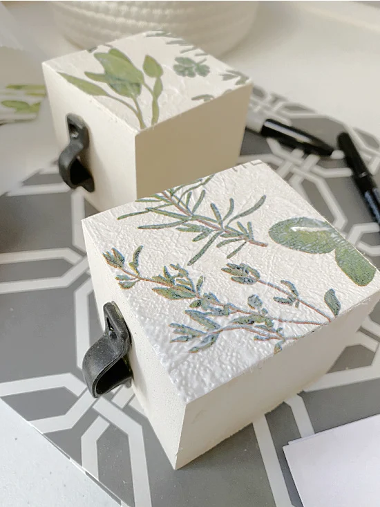 decoupaged drawer sides with herb napkins