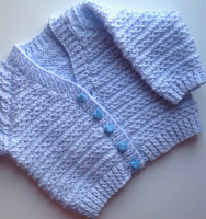 https://www.ravelry.com/patterns/library/waves-of-love-baby-cardigan