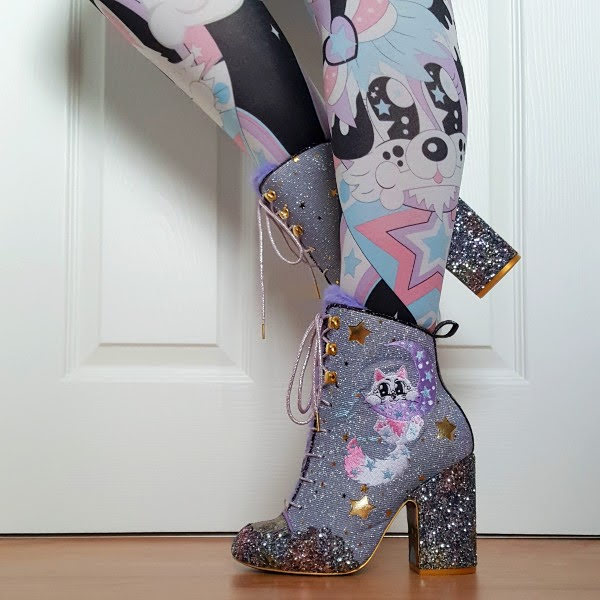 wearing lilac sparkling ankle boots with cat embroidery