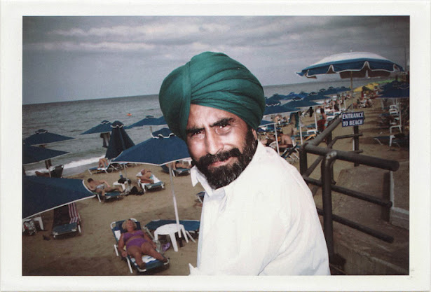 dirty photos - on the island of - photo of indian man with head top at the beach