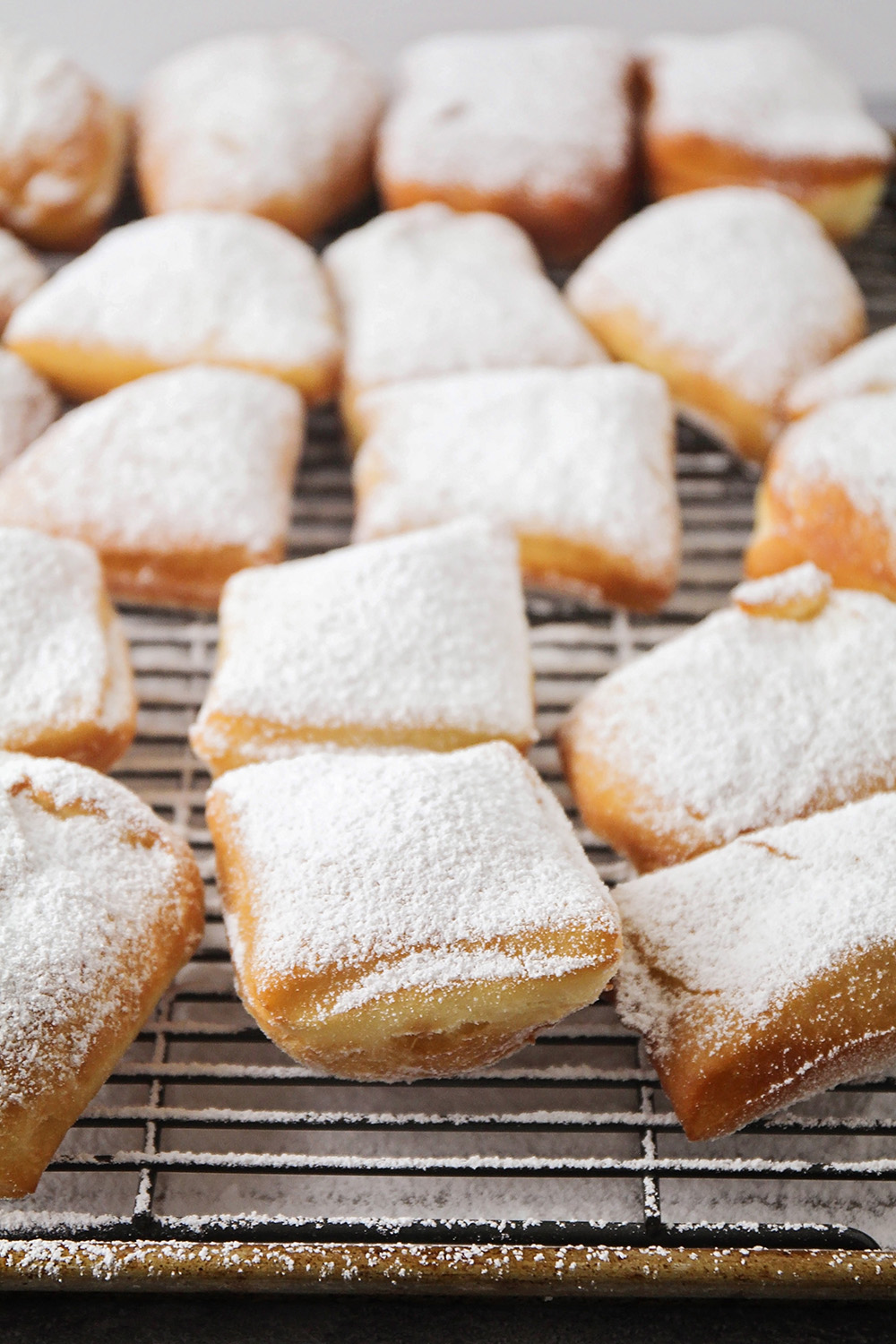 These easy homemade beignets are absolutely divine! They're light and fluffy, with the perfect amount of sweetness. So delicious and easy to make!