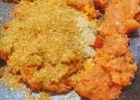 Adding masala powder for chole(chickpeas) recipe