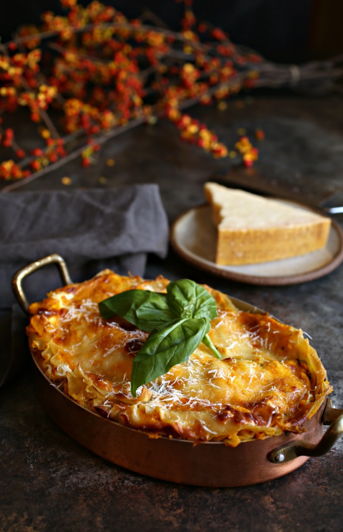Recipe for lasagna made with a creamy butternut squash and Parmesan bechamel sauce.