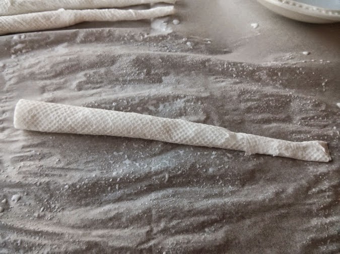 After rolling them, twist them a bit and play with them, squeezing out