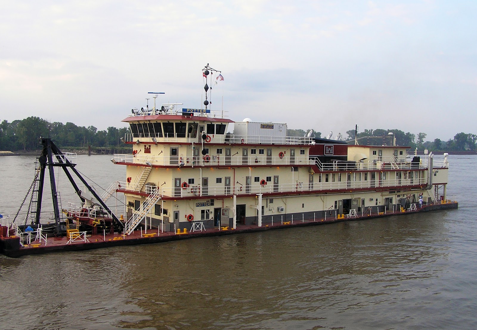 St. Louis District Dredge Potter makes way for barges on the