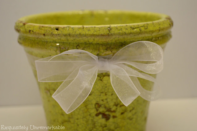 Green FLower Pot with a ribbon and blow glued on