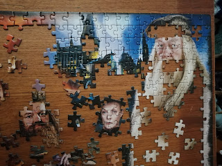 A portion of a harry powtter jigsaw with a lot of the connecting pieces missing