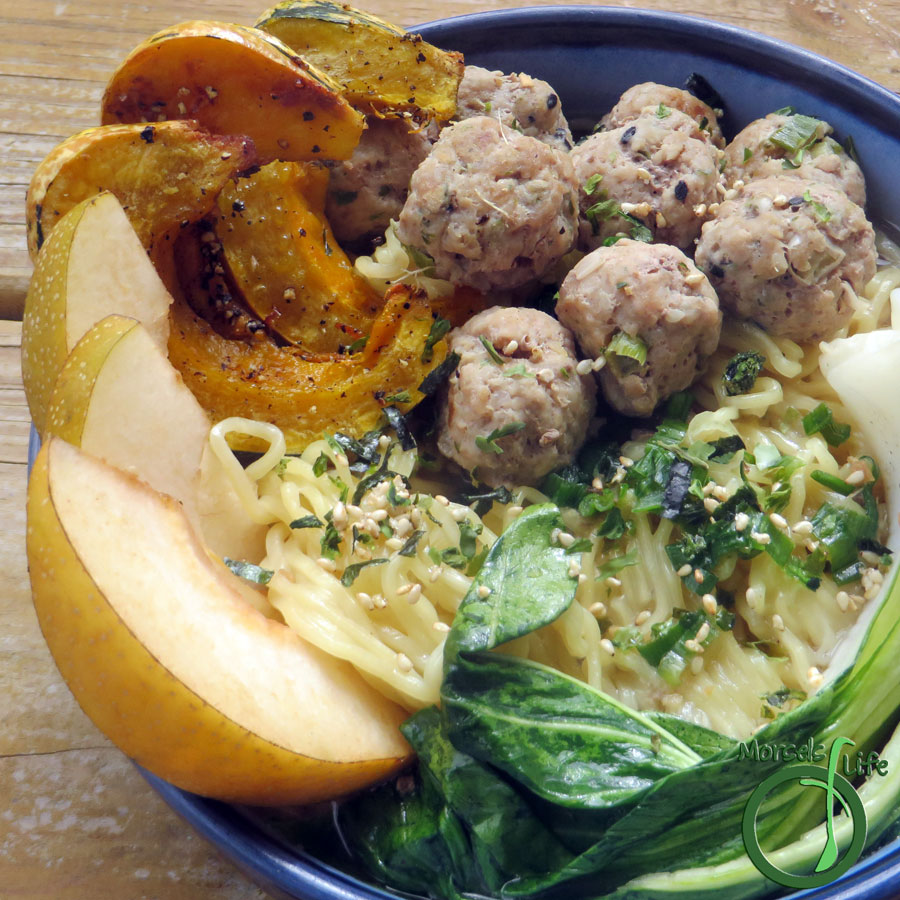 Morsels of Life - Pork Meatball Ramen - Fresh ramen, topped with ginger and green onion pork meatballs served in miso soup, then garnished with roasted winter squash for one scrumptious pork meatball ramen.