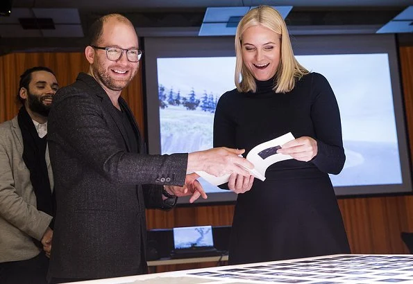 Crown Princess Mette-Marit of Norway visited the Oslo School of Architecture and Design. Princess Prada boots and Stella McCartney wool coat