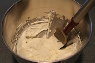 confectioners sugar, cream cheese, heavy whipping cream, clear vanilla