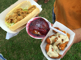 From left to right: Fried Oyster Po-Boy, Blackberry Cobbler, and Crawfish Beignets