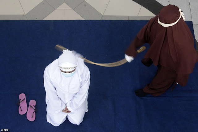 Oh no! Four Couples Are Publicly Flogged In Indonesia For Having S*x Outside Marriage (Pictures)