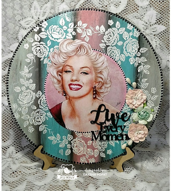 Decoupage with faux wood effect and lace work.