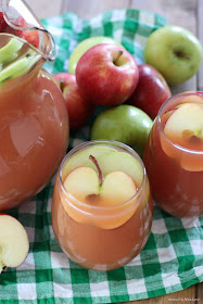 apple pear and orange punch in glass