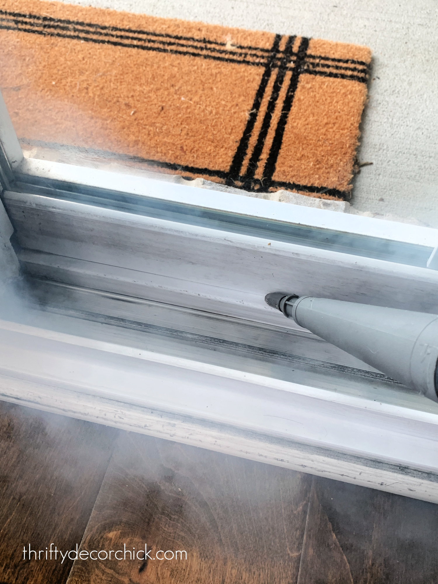 cleaning window tracks with steamer