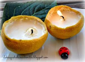 Velas hechas dentro de un limón
