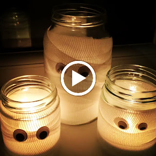 Video of the candle holders with lit candles flickering inside them