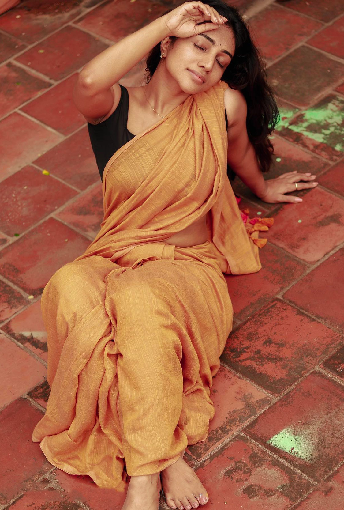 Bommu Lakshmi In orange cotton Saree Hot Photos