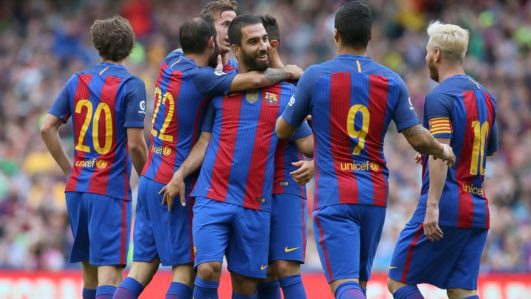 Messi quiet but Barcelona stroll past Celtic