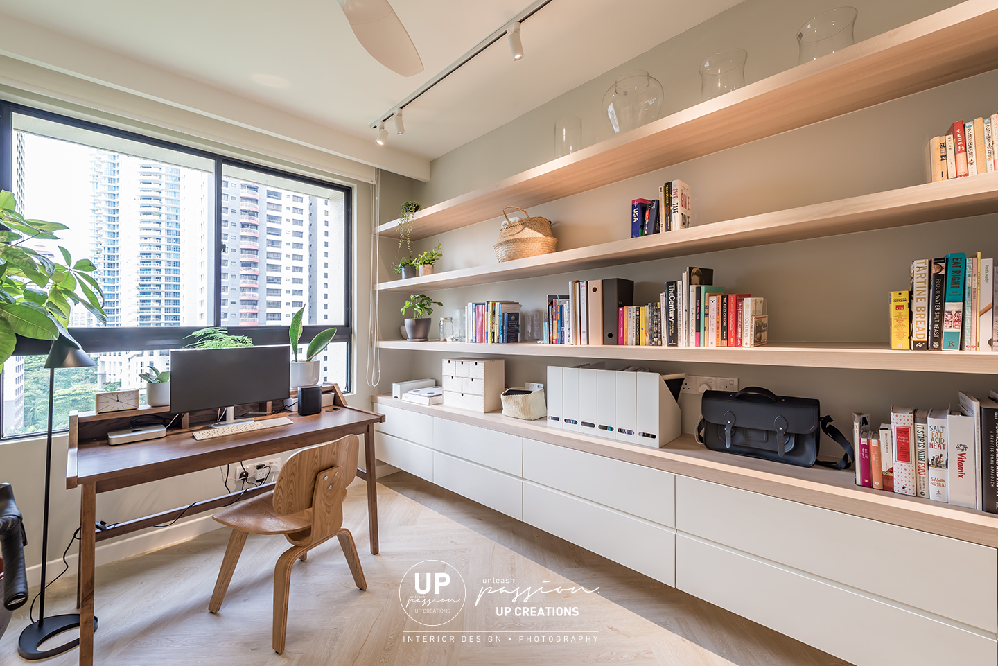 Mont Kiara Pines condo study room with wood texture shelf and white color cabinet and a solid wood study table