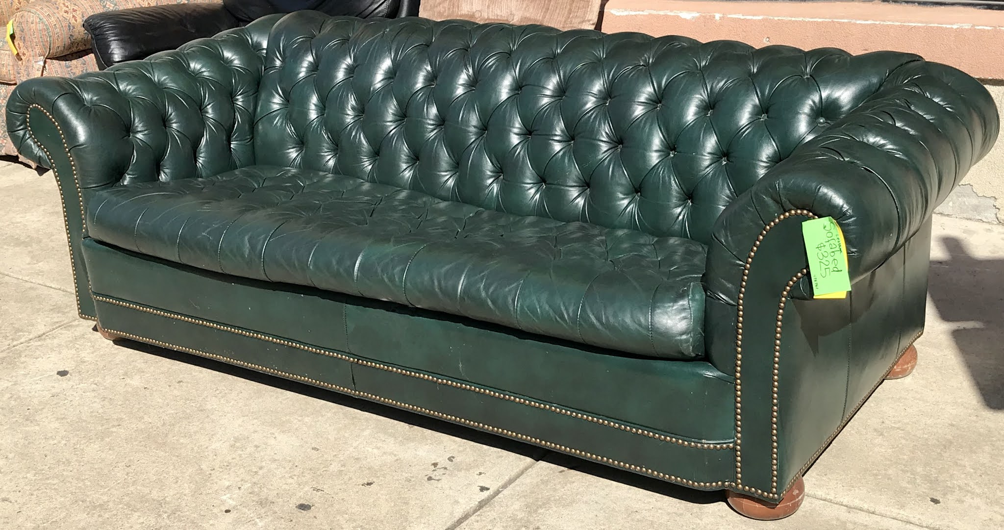 oversized green leather sofa