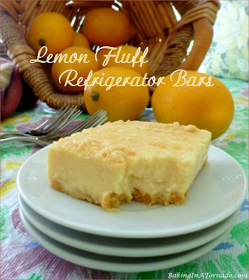 Lemon Fluff Refrigerator Bars (with a lower fat option) are a sweet, citrusy summer dessert. | Recipe developed by www.BakingInATornado.com | #recipe #dessert