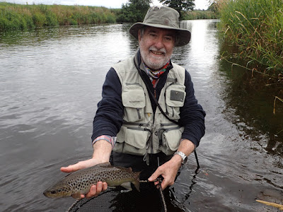 A nice fish from a coloured river!