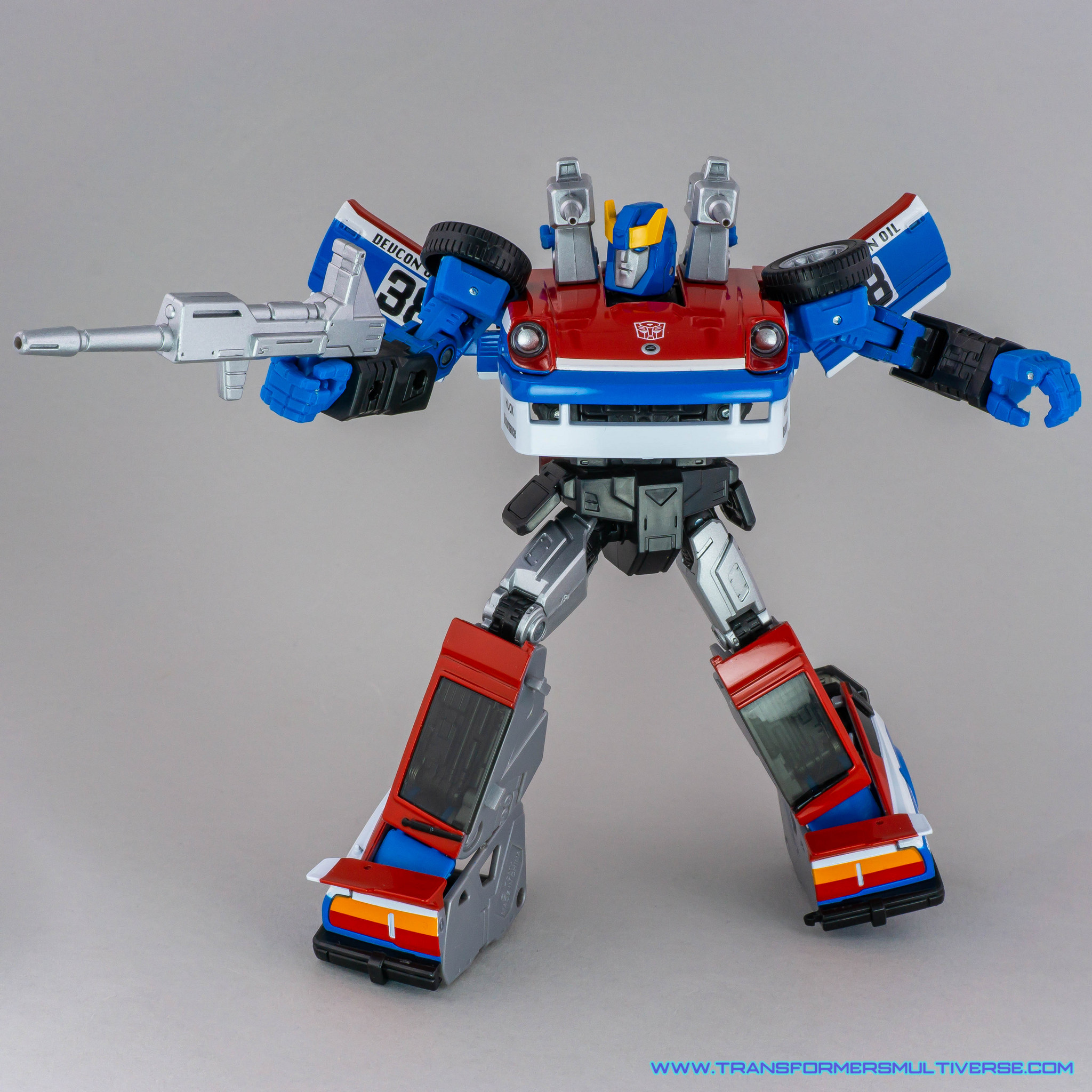 Transformers Masterpiece Smokescreen posed with rifle