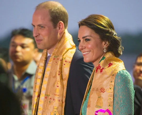 Kete Middleton and Prince William arrive at Tezpur Airport in Assam. Kate wore Temperley London Lace Dress, Kiki earrings, Lk. Bennett cluth and shoes