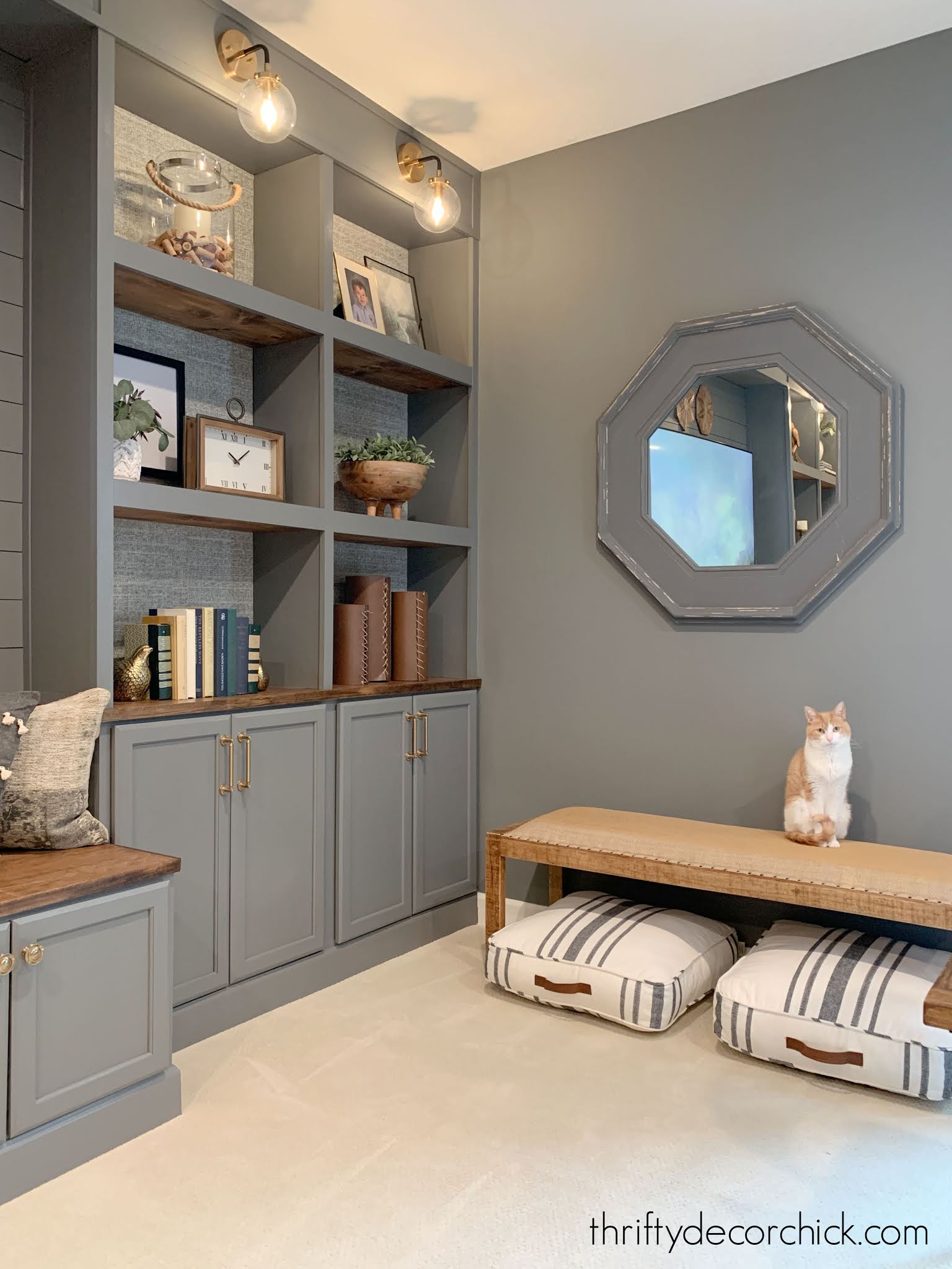 DIY built in bookcase wall in the basement {The reveal!}