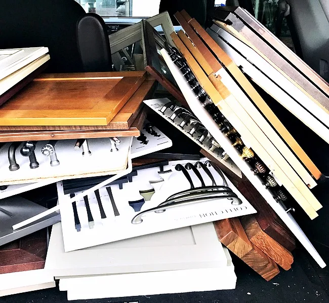 trunk full of cabinet doors and hardware.