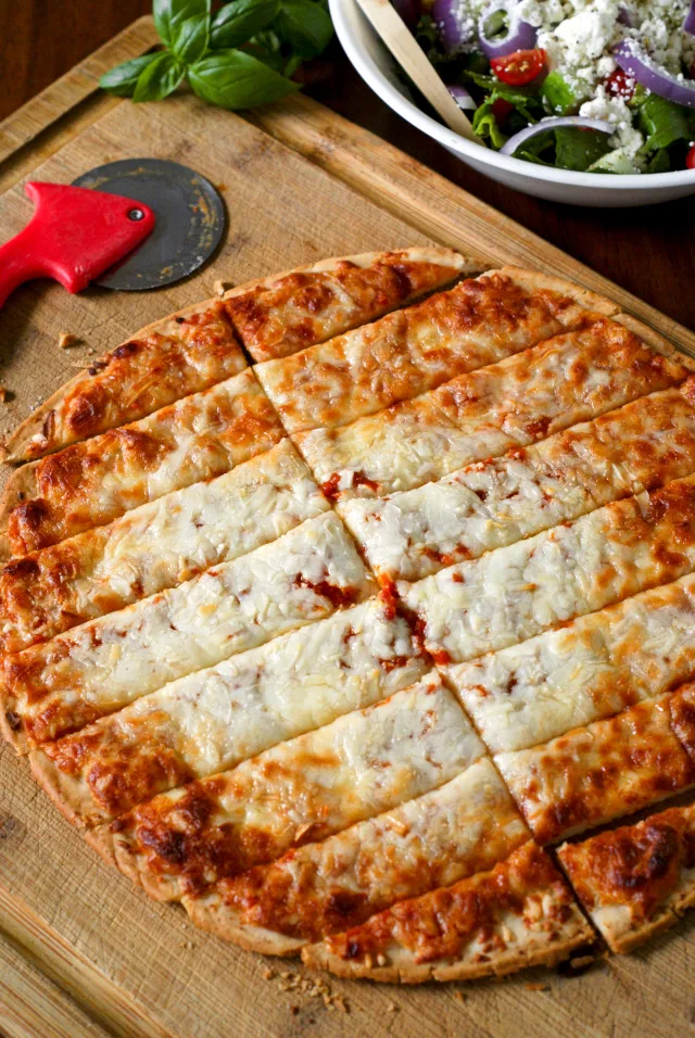 Pizza Sticks with Three Cheese Alfredo Dip | thetwobiteclub.com