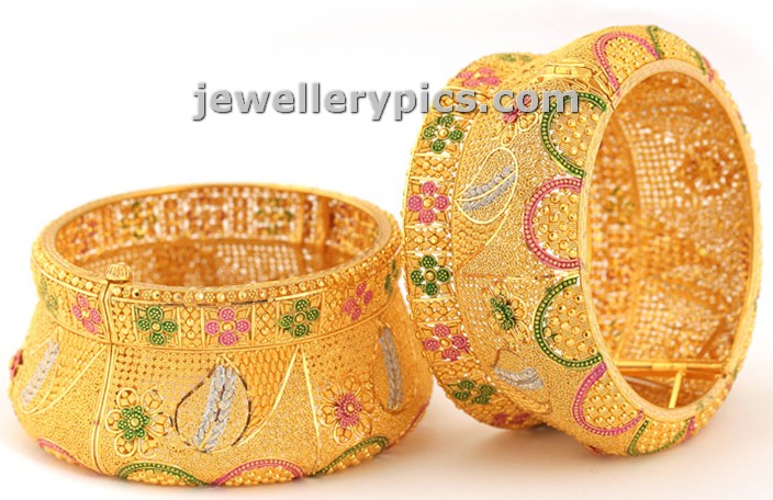 jewelry: Wide gold bangle beautiful designs by Saravana jewellers